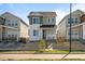 Charming two-story home with a well-manicured lawn and inviting curb appeal at 5936 N Lisbon St, Aurora, CO 80019