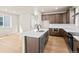 Bright kitchen featuring a center island, stainless steel appliances, and plenty of natural light at 5936 N Lisbon St, Aurora, CO 80019