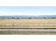 Expansive view overlooking land with clear blue sky and majestic mountains in the distance at 5936 N Lisbon St, Aurora, CO 80019