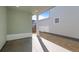 Covered patio with concrete floor, painted brick and wooden fence at 5936 N Lisbon St, Aurora, CO 80019