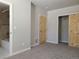 Spacious bedroom with closet, bathroom, and carpeted flooring at 656 County Road 72, Bailey, CO 80421
