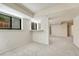 Finished basement featuring neutral carpet, natural light, and a bright aesthetic at 5672 S Hanover Way, Greenwood Village, CO 80111