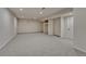 Finished basement space featuring neutral carpet, recessed lighting, and flexible area for various purposes at 5672 S Hanover Way, Greenwood Village, CO 80111