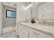 Bathroom featuring a double vanity, granite counters, soaking tub and a separate shower at 5672 S Hanover Way, Greenwood Village, CO 80111