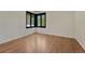 Empty bedroom featuring a black corner window at 5672 S Hanover Way, Greenwood Village, CO 80111