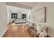 Spacious bedroom with hardwood floors and modern decor at 5672 S Hanover Way, Greenwood Village, CO 80111