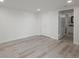 Bedroom featuring wood floors, closet, and an open doorway to a bathroom at 800 N Pearl St # 611, Denver, CO 80203