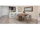Dining area with modern table set, kitchen access and stylish lighting at 800 N Pearl St # 611, Denver, CO 80203