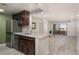 Open kitchen layout with modern appliances and views of the living room and city skyline at 800 N Pearl St # 611, Denver, CO 80203