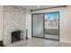Living room features include a fireplace, hardwood floors, and natural light from the balcony at 800 N Pearl St # 611, Denver, CO 80203