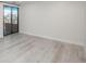 Bright living room featuring sleek floors and a sliding glass door, filling the space with natural light at 800 N Pearl St # 611, Denver, CO 80203