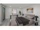 Bright main bedroom boasts modern decor, a comfortable bed, and sleek furniture at 800 N Pearl St # 611, Denver, CO 80203