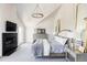 Spacious bedroom with fireplace and large windows at 9356 Cherrywood Trl, Littleton, CO 80127