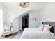 Charming bedroom with white walls and wood flooring at 9356 Cherrywood Trl, Littleton, CO 80127