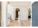 Bright entryway with hardwood floors and access to other rooms at 9356 Cherrywood Trl, Littleton, CO 80127