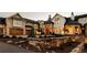 Elegant home with stone accents, multiple garages, and gated entry at 9356 Cherrywood Trl, Littleton, CO 80127