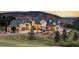 Luxury home with mountain views, expansive driveway, and landscaped grounds at 9356 Cherrywood Trl, Littleton, CO 80127