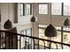 High-ceilinged entryway with pendant lighting and scenic view at 9356 Cherrywood Trl, Littleton, CO 80127