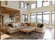 Spacious living area with large windows, sectional sofa, and mountain views at 9356 Cherrywood Trl, Littleton, CO 80127