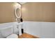Charming half-bathroom with pedestal sink and updated fixtures at 9925 W 20Th Ave # 17, Lakewood, CO 80215
