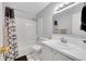 Clean and bright bathroom featuring a shower-tub combo and modern vanity at 9925 W 20Th Ave # 17, Lakewood, CO 80215