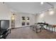 Cozy living room featuring a large window letting in ample natural light at 9925 W 20Th Ave # 17, Lakewood, CO 80215