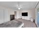 Bright main bedroom with neutral tones, ceiling fan, closet and sliding doors at 9925 W 20Th Ave # 17, Lakewood, CO 80215