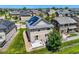 Aerial view of home with back patio, backyard, solar panels and well-maintained lawn at 3508 E 140Th Pl, Thornton, CO 80602