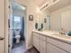 Bathroom featuring double vanity, tile floor, a shower and a toilet at 3508 E 140Th Pl, Thornton, CO 80602