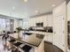 Modern kitchen with large center island, stainless appliances, and plenty of counter space at 3508 E 140Th Pl, Thornton, CO 80602