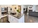 Updated kitchen with stainless steel appliances, granite countertops, and large island at 3508 E 140Th Pl, Thornton, CO 80602