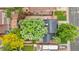 Bird's-eye view of a home with an outdoor patio and mature landscaping, offering a private backyard retreat at 1285 Aberdeen Dr, Broomfield, CO 80020