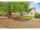 Spacious backyard with a fire pit and chairs offering a great space for outdoor entertaining and relaxation at 1285 Aberdeen Dr, Broomfield, CO 80020