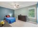 Cozy bedroom with an abundance of natural light, carpeted floor, ceiling fan, and closet at 1285 Aberdeen Dr, Broomfield, CO 80020