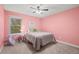 Charming bedroom with neutral carpet, ceiling fan, and natural light at 1285 Aberdeen Dr, Broomfield, CO 80020