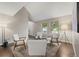 Bright living room with modern furniture, hardwood floors, and large windows offering ample natural light at 1285 Aberdeen Dr, Broomfield, CO 80020