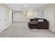 Spacious carpeted living room featuring recessed lighting and comfortable seating at 1285 Aberdeen Dr, Broomfield, CO 80020