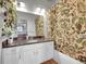 Bathroom featuring a vanity with granite countertop, white cabinets, a tub with shower and green printed curtain at 290 W 12Th Ave # 205, Denver, CO 80204