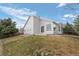 Rear elevation of home highlighting the backyard and upper deck at 1757 Baguette Dr, Castle Rock, CO 80108