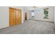 Bedroom with large closet, plush carpet, natural light, and ceiling fan at 1757 Baguette Dr, Castle Rock, CO 80108