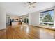 Spacious living room featuring an open floor plan with wood floors and large windows at 1757 Baguette Dr, Castle Rock, CO 80108