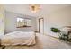 Bright bedroom with ample natural light, carpet, and ceiling fan at 19375 Sherwood Trl, Monument, CO 80132