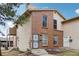 Charming two-story home with brick and siding exterior at 925 Elm St, Denver, CO 80220