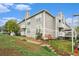 Charming multi-story condo with balconies and well-maintained landscaping and walkways at 4460 S Pitkin St # 119, Aurora, CO 80015