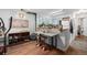 Open living space with a small breakfast bar leading into the kitchen area at 4460 S Pitkin St # 119, Aurora, CO 80015