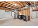 Unfinished basement with washer, dryer, water heater, and wrapped walls and ceiling at 10681 Cherrybrook Cir, Highlands Ranch, CO 80126