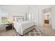 Comfortable bedroom features natural light, a ceiling fan and updated décor at 10681 Cherrybrook Cir, Highlands Ranch, CO 80126