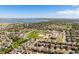 Desirable community, featuring parks, schools, and a lake in the distance at 13360 W 83Rd Pl, Arvada, CO 80005