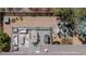 Aerial view of the backyard deck and patio with outdoor seating, dining area and grill at 13360 W 83Rd Pl, Arvada, CO 80005