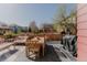 Deck with comfortable seating, dining table, and grill, great for outdoor dining at 13360 W 83Rd Pl, Arvada, CO 80005
